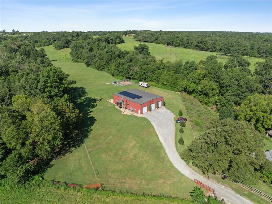 Welcome to the farm! Here we blend rustic charm with modern comfort! If you're tired of living in a subdivision and POAs telling you that can't raise chickens then this hobby farm is your new dream home. In addition to the 4bd and 3 full bath, there are two bonus rooms, a man cave, shooting range, dog kennels, and a chicken coop. Don't forget, there's also enough enclosed pasture for horses, farm animals, or up to 15 head of cattle. Home can be sold FULLY FURNISHED.

If you're also interested in living off grid then you should know this property is almost completely energy independent. In addition to the well and septic tank, the property now boasts more than $70K in solar panel and battery upgrades. 

This property isn't a home, it's a lifestyle. This is a sanctuary for nature lovers seeking privacy and freedom. Discover your perfect blend of country living and modern luxury! With the addition of the new bypass, popular attractions like Downtown Bentonville, work, and play are only 30min away.