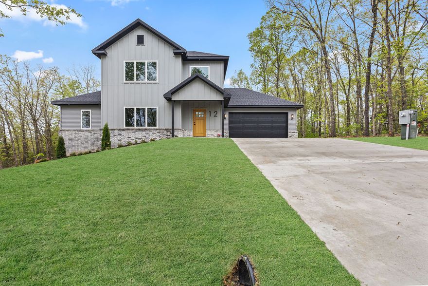 New Construction on a very quiet cul-de-sac, just a half mile from The Back 40 Trail System. This thoughtfully designed modern beauty is a split floor plan three bedrooms, two baths, featuring tons of natural light from the picture windows. Built ins surrounding an electric fireplace. Large quartz kitchen island and cabinet storage galore. Luxury Vinyl Plank flooring throughout the entire home. Dual vanity master bath with a walk-in shower. One year builder warranty. Covered back deck. Great location in Bentonville Schools. Plans and measurement attached in MLS.