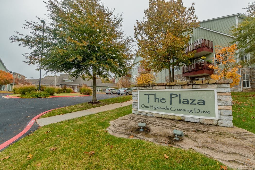 Shown by appointment only. Cash purchase required. Updated 2nd floor end unit offers 1,330 sf, 2 large bedrooms, den, 2 baths, in-unit laundry & great wooded views. Kitchen is updated with granite countertops, tall kitchen cabinets and pantry. You purchase a share of the cooperative & then pay a monthly fee of $1,591 that covers all living expenses, including mortgage, except telephone & internet connection. Each unit has its own geothermal HVAC & water heater. The facility offers a library, community room, workshop, storage area, storm shelter, pool table, piano, caterer's kitchen, walking trail, exercise room, guest apartment & so much more. This type of lifestyle is the epitome of easy living. You simply lock the door and go as all the maintenance is done for you. No more mowing, power washing, weed spraying or any of the other things you currently do. The Plaza has lots of social activities & a very pleasant atmosphere throughout the building. This is one of the nicest units available. Call today for a showing.
