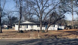 New Listing Alert! Welcome home to this spacious gem! Enjoy 3 roomy bedrooms, 2 bathrooms, a generous kitchen, and living room perfect for cozy nights. Host gatherings in style with a spacious dining area and large yard. Plus, envision the possibilities with an outside building that could easily e transformed into an apartment or mother -in - law quarters. House is selling as is except for the new roof on the home. Book your showing!