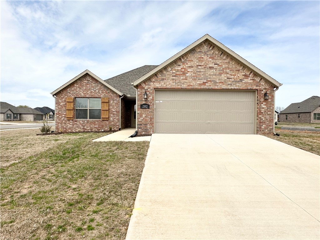 Check out this beautiful, new construction 4 bedroom/2 bathroom home in the Wagon Wheel subdivision! This home is located within 10 or less minutes of I-49, Farmington High School, Walmart Neighborhood Market, and several restaurants & amenities. Move-in ready now!