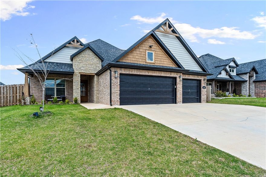 This beautiful home features 4 bedrooms and 3.5 bathrooms, offering an ideal layout for a growing family. The open floorplan includes a spacious family room, oversized kitchen island, large dining area, and extensive added storage. The seller invested $30,000 in upgrades in 2025, including a 100 sq. ft. detached outdoor office with walkway pavers. The screened-in patio with a gas log fireplace creates a perfect year-round entertaining space, complemented by a charming front porch. A Tesla EV charger is installed in the 3-car garage for added convenience. Located within walking distance of local schools, the community playground, and the neighborhood pool, this home delivers comfort, functionality, and an exceptional family-friendly lifestyle.