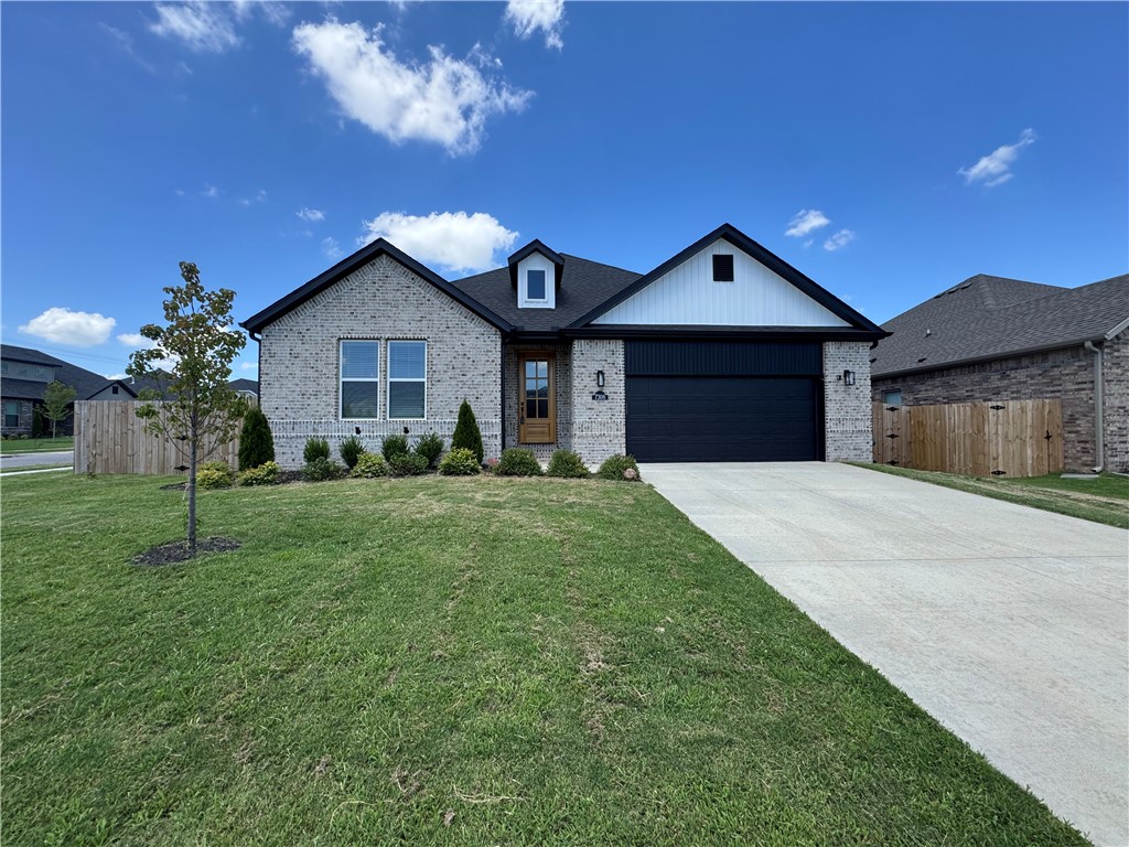 Welcome to your dream home in the new Walnut Grove subdivision in Bentonville with Refrigerator, Washer and Dryer included! Enjoy a spacious, open-concept layout with luxurious finishes including quartz countertops, privacy fence, & upgraded lighting fixtures. The stylish luxury vinyl plank flooring enhances the contemporary feel of each room. The living room is a highlight, featuring a cozy gas fireplace perfect for relaxing. The kitchen is equipped with a gas range & offers ample space for cooking & entertaining. You are just 5 minutes to XNA, and under 20 minutes to Downtown Bentonville and new Walmart Campus!