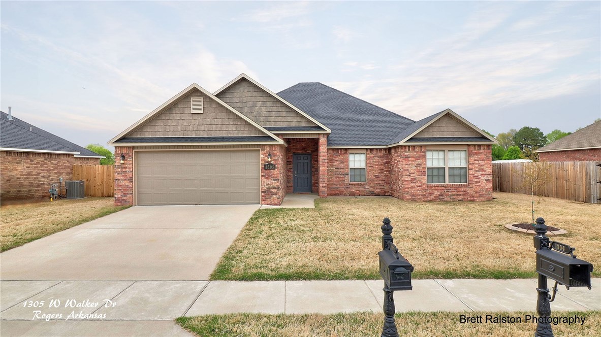 Outstanding family home just like new. Open floor plan with room to entertain family and friends, wood flooring throughout home and tile in bathrooms, 3 bedrooms and 2 full baths, open field behind this home for nice view. Granite countertops, eat-in kitchen, split bedroom floorplan, great storage space in closets, home located on quiet street, convenient location close to Wal-Mart home office and NWACC
