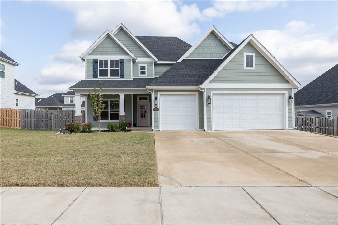 Welcome to your new Craftsman style home in the Crescent View Subdivision! This two level home boasts 4 spacious bedrooms, 3.5 bathrooms, a large bonus room, and a downstairs office all while having a beautiful open floor plan. Enjoy entertaining on your covered back patio right off of the kitchen. The kitchen is equipped with a gas cooktop, built-in microwave, and a large island with quartz countertops. Experience upgraded amenities such as power blinds, custom light fixtures, solar panels, and a privacy fence in the backyard. This home is located just minutes from Janie Darr Elementary, Mt. Hebron Park, and I-49 giving you easy access to all the entertainment Northwest Arkansas has to offer. This home will not last long! *Tonal workout system in the garage to convey.*