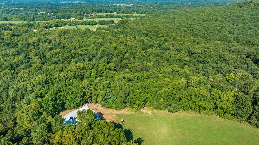 Located in Goshen Arkansas and in the Fayetteville School District you will find a rare opportunity to build your custom home on a private five acre lot located in the prestigious Cedar Ranch Estates. Designed to preserve the natural beauty and privacy appreciated in the Goshen area, and with opportunity to design the perfect dream estate. Each lot is uniquely different ranging from beautiful valley views, to stream side oasis, to pond side elegance, to rolling grassy fields. With each lot you will have the opportunity to create a home on an estate sized lot with the unique features desired by everyone. Come visit Cedar Ranch Estates and make it your last home.