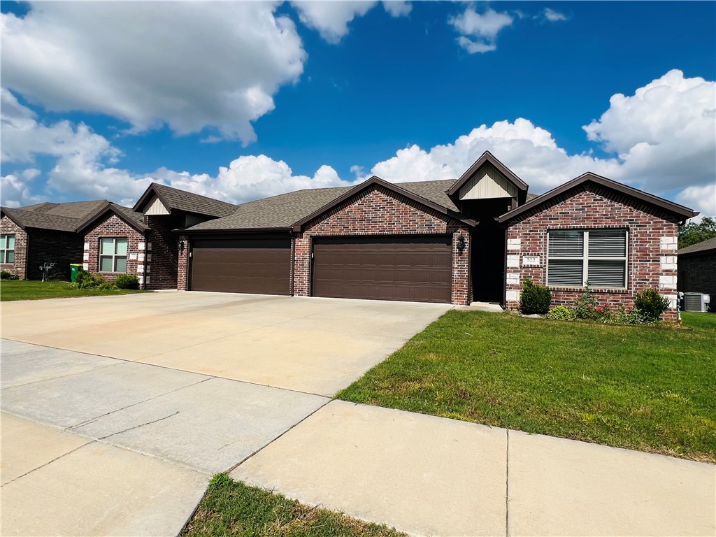 Newer Duplex close to everything! 3 bedrooms, 2 baths, granite countertops and wood looking tile plus washer, dryer, and fridge included! Come and view this home before it's gone!
