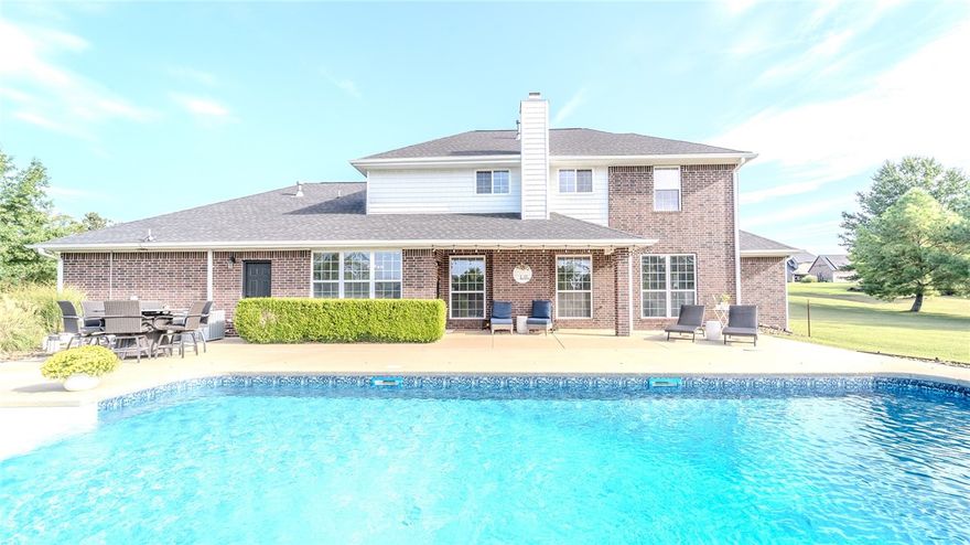 Freshly painted and beautifully maintained, this 4-bed, 2.5-bath estate blends comfort, style, and thoughtful design. Inside you’ll find hardwood floors, new carpet, and updated finishes that give the home a warm, inviting feel.

The main level features a bright living area, dedicated office, and modern kitchen that opens to the dining space. Upstairs, a bonus/media room and flex area provide options for a gym, hobbies, or movie nights.

Set on 1.88 peaceful acres, the backyard showcases a saltwater pool and spacious patio ideal for relaxing or entertaining. Every detail has been carefully maintained, making this home move-in ready.

Located in Cave Springs (Bentonville address), it offers the best of both worlds—quiet living just minutes from XNA, Bentonville, and Fayetteville. A rare chance to own a turnkey estate in Northwest Arkansas.