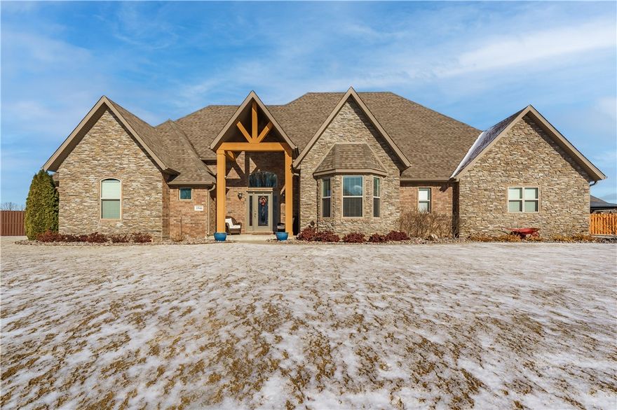 Located within walking distance to Lake Elmdale, this 4 bed, 3.5 bath home seamlessly blends luxury & functionality on a 0.5-acre lot. The backyard is a private oasis featuring a saltwater pool w/ a rock waterfall, new pump & filtration system, a separate pavilion, & full landscaping with sprinkler system. The 3-car garage features epoxy floors & an in-ground basketball goal. Inside, enjoy an exceptionally well-maintained split floor plan w/ a cathedral ceiling, gas fireplace, & premium finishes throughout. The kitchen wows with a large island, gas range, pot filler, & a massive walk-in pantry. The primary suite includes a lofted ceiling, luxurious bath, walk-in closet w/ built-ins, & direct access to a laundry room w/ sink & storage. Upstairs, the bonus room w/ a half bath is perfect for an office, playroom, or media space. Just 1.5 miles from I-49, you’ll have quick access to all that NWA offers, plus nearby to Mercy and Children’s hospitals.