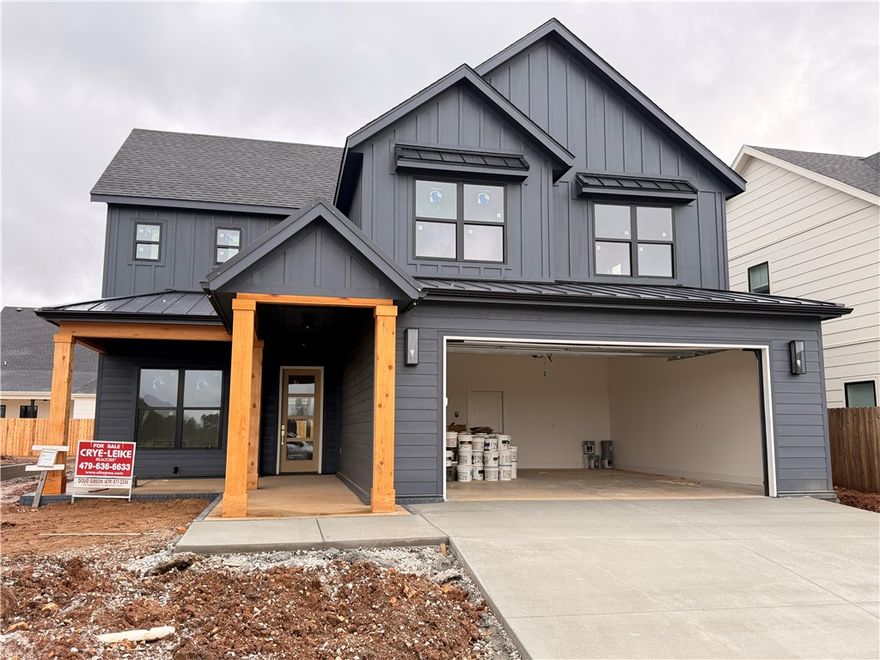 Welcome to Meadow Brook in SW Rogers! Great community in the best location! This plan features 3-4 bedrooms (2 flex spaces either bedroom 2 or study option as well as upstairs bedroom 4 or bonus room). All bedrooms have walk-in closets with plenty of storage! Downstairs you will find the primary bedroom. Great layout with open kitchen/living room area. Kitchen has large island to sit up to 6 bar stools, built-in gas cook top, built-in oven and microwave, large pantry, and eat in dining area. Primary bedroom feature en suite bathroom with soaking tub, walk-in shower, his and hers separate vanities, and large closet with lots of built-ins. Bedrooms 2, 3 & 4/bonus room are upstairs along with a full bathroom. Enjoy the evenings grilling on the covered back patio! Can't beat location being only minutes to shopping, dining, groceries stores, and only steps to the Razorback Greenway Trail.