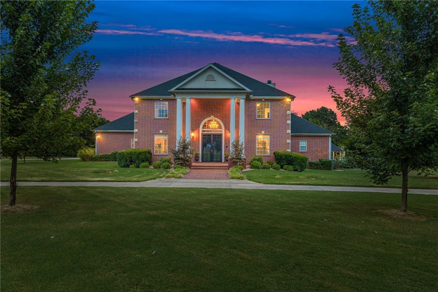Rare Estate Property on 4.98 acres in Rogers, featuring an immaculate custom built colonial home, full inlaw suite & heated, saltwater pool. Sought after location in the Uptown Rogers shopping, dining, entertainment district! All new interior paint and flooring.This 5,932 SF home offers multiple living spaces & 4 bedrooms with private baths. Home office, formal dining room, renovated kitchen w/abundant cabinetry, an island, pantry & eat in area with fireplace. Formal living room includes raised ceilings,fireplace, large windows & patio access, while a living room on main level adds extra gathering space. Primary suite boasts a fireplace, sitting area & luxurious attached bath. Upstairs are two guest bedrooms with baths and walk-in closets and 2 bonus rooms ideal for media & game spaces. A breezeway leads to the guest suite with full kitchen and bath. Outdoors, enjoy the patio, pool and gazebo with fireplace, surrounded by lush landscaping. Updates include a new roof ‘20, HVAC & water heater ’18 & pool liner ‘23.