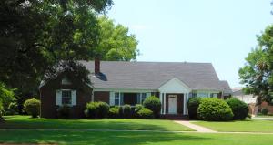 Whether you need a beautiful downtown office space, a large family home that's perfectly located, OR BOTH...This is the house for you! This gracious house is a class act just oozing with charm and potential. Well built and lovingly maintained with plenty of space for everyone. Three or four bedrooms as well as a den or office are yours! Get out your checklist...this one has it all. Wishing for a bonus room for the kids? Want to walk to the Christmas parade and downtown restaurants? Want larger bedrooms? Need a large and lush back yard? What about a Sun Porch? Hurry...The possibilitiesare endless!