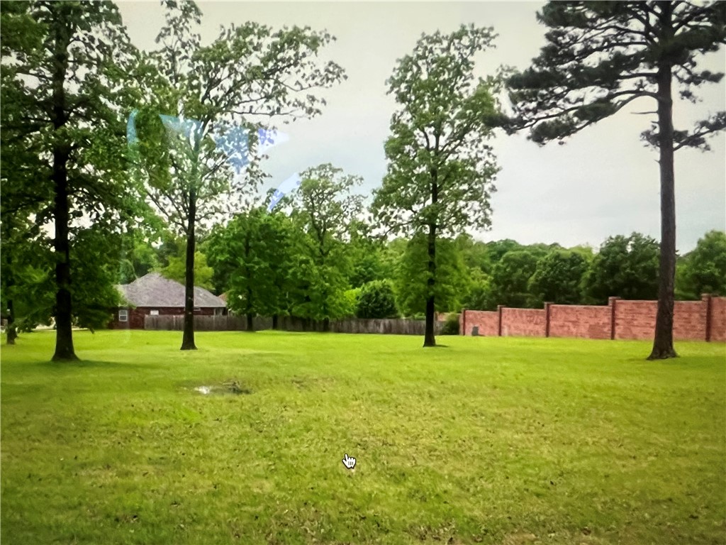 2 Cleared and Flat lots in the Beautiful Bluffs of Holiday Island! .88 acres with All utilities available plus Sewer AND Water at the street in Eureka Springs School District! This cozy little neighborhood with stunning Bluff Views is nestled just off HWY 23, at the base of Holiday Island's Golf Course and Grill, with Grocery and Hardware Stores less than a mile away. Table Rock Lake and Paddle Board Beach is less than 3 miles away and Historic Eureka Springs 4 miles away! This sleepy town is finally waking up and building your perfect new home has never been easier. Contractor Concierge Srvc available so you can stay focused on the dream w/o the headache of permitting. Owner Financing is also available!!! Holiday Island is home to 2 Golf Courses, 2 Swimming Pools, Pickle Ball Court, Miniature Golf, and most importantly a Full Service Marina! Beachy Swimming Holes and Picnic Areas are all over town. Lake Life & Mountain Hikes in the Ozarks!. Pedal, Paddle & Putt!! Holiday Island is the City that Lives to Play!