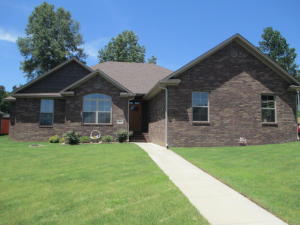 Seller to pay up to $1,800 in Buyer closing costs for contracts through 7/31. See this Beautifully maintained 1 year new home in up & coming neighborhood. Quality Built 3 Bed/2 Ba home w/ bonus office. Split floor plan w/ open kit, living area w/ large bar. Home has lots of style and character w/ trayed ceilings & tons of crown. Located on a corner lot & includes the specialty storage building