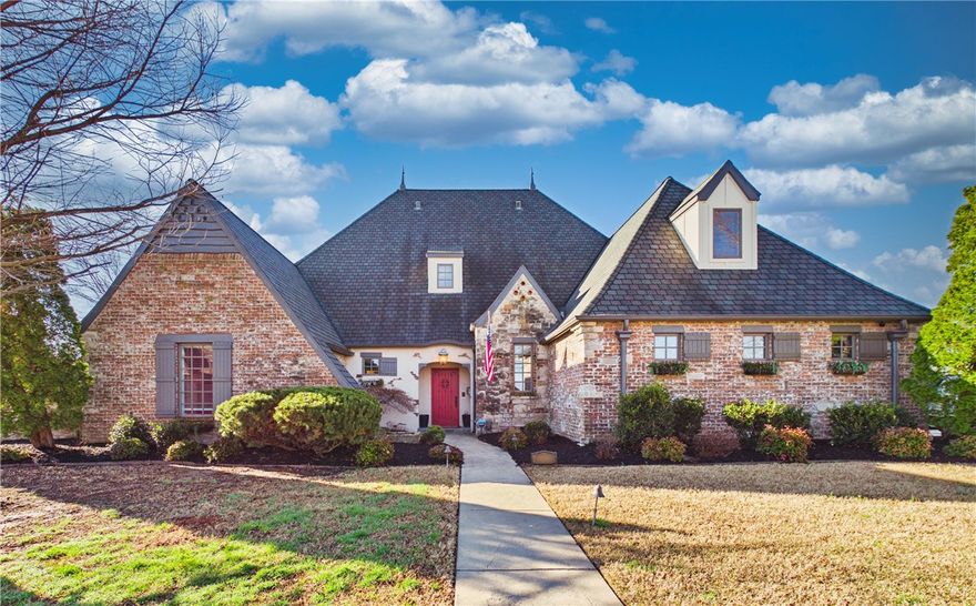 Step inside this charming Tuscan-style home in one of Bentonville’s most sought-after established neighborhoods and instantly feel at home. Just minutes from the Downtown Bentonville Square, Walmart Global Campus, restaurants, and Coler Mountain Bike Preserve world-class biking trails, this location is hard to beat. As you enter, you’re welcomed by soaring vaulted ceilings with rich espresso beams and LVP flooring. You will love the neutral color palette which reflects the natural light coming in from the abundance of windows. The French country-inspired kitchen feels like a European countryside retreat, featuring stainless steel appliances, granite countertops, abundant cabinetry, a large island, and a cozy eat-in dining area perfect for gathering. You will appreciate the number of upgrades featured in the home. Enjoy outdoor patio meals and entertaining on two patios each easily accessible from the kitchen and living areas. This truly one-of-a-kind home must be experienced to appreciate. Ask for Feature Sheet.