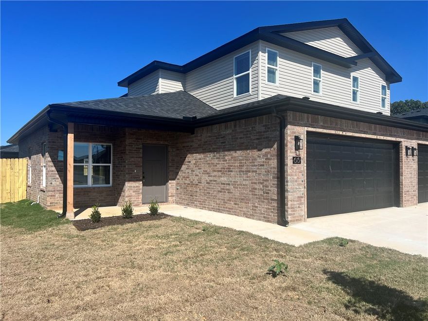 Brand new construction! This spacious 3-bedroom, 2.5-bath townhouse style duplex offers modern living in a prime Centerton location near downtown & the Walmart Distribution Center. Featuring luxury vinyl plank flooring with upgraded carpet on stairs for added comfort. Enjoy an open-concept layout with granite countertops and stainless-steel appliances. All major appliances included—washer and dryer, too! The private backyard is perfect for entertaining, and the 2-car garage provides ample storage. Tenants are responsible for all utilities and lawn maintenance. Don't miss this opportunity for stylish, low maintenance living in a growing community!