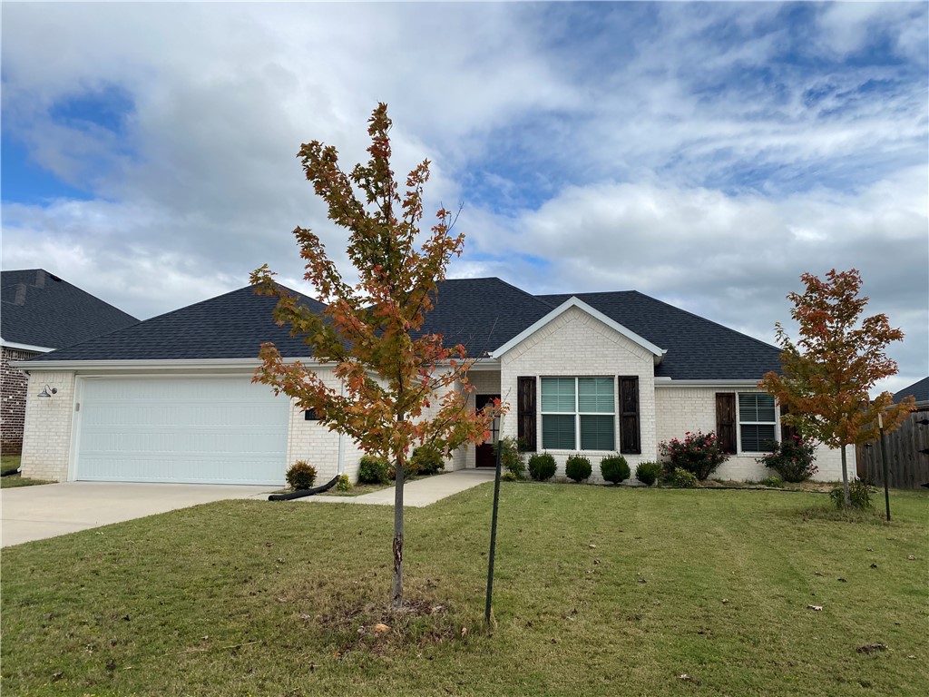 Spacious single-level 4-bedroom, 2-bathroom home with split floor plan, fenced backyard, covered patio, and 2-car garage, near golf course.
This beautiful single-level home is perfect for families or anyone who wants plenty of space to spread out. The split floor plan provides privacy for the primary bedroom, which features a walk-in closet and en-suite bathroom. The other three bedrooms are located on the opposite side of the house and share a full bathroom.
Spacious living room with a fireplace is open to a gourmet kitchen with stainless steel appliances and granite countertops, and a dining room. The backyard is perfect for entertaining, with a covered patio and plenty of space for kids to play.