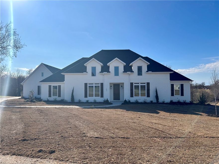 This beautiful 1.70 acre lot has a gorgeous new construction home. This is a one of a kind single story home that has many wonderful features. This home has an oversized 3 car garage, 4 bedrooms, 4 full bathrooms, a separate office, a separate media/playroom/homeschooling room, and a wood patio overlooking a private backyard. This lot ends in a wooded ravine and shares a pond. Each bedroom includes huge walk in closets. The center of the home features a large living room with vaulted ceilings, an open kitchen, and a butlers pantry connected to a large pantry. The landscaping includes irrigation and the garage doors are insulated. Highlands at Elm Springs is a beautiful and highly sought after gated community.