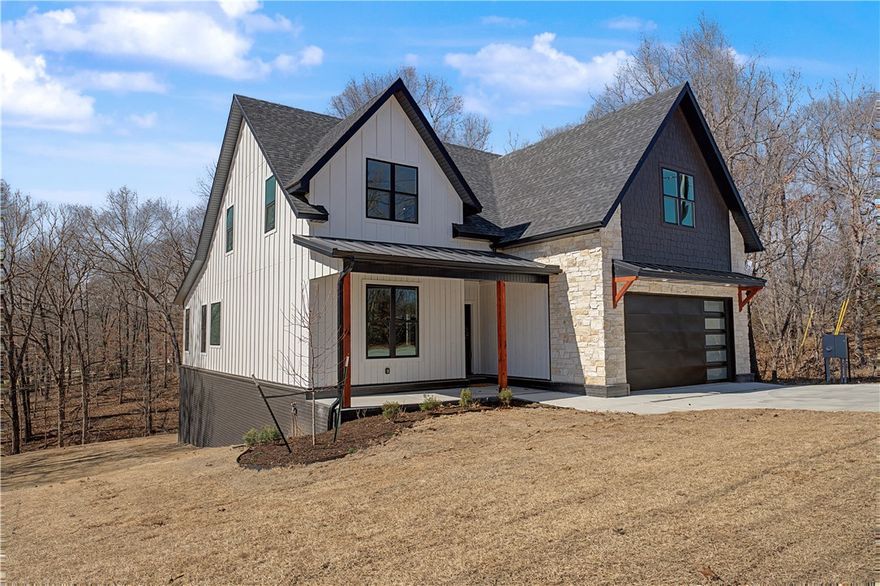 Quality craftsmanship, peaceful wooded views, over an acre, and a HUGE unfinished basement! With a mix of timeless and modern styles, this well-crafted and beautifully finished home has 4 bedrooms, an office or den, a bonus room, & 4 full bathrooms, plus 1587+- square feet of unfinished basement with high ceilings & plumbing! Basement not included in square footage. Enjoy the security of a safe room / tornado shelter, a yard to play in, and a beautiful wooded view. Two nice flat yard areas in the side and back to play! Tons of extra value in the basement: use it as it is, or turn it into an exercise / workout area, workshop, mother-in-law suite, or use the thoughtfully planned multiple entries for extra income! Great opportunity for multi-generational living if that's what you need. 360 degree virtual tour available on separate site - just like you are walking through it! (Ask agents) Homes with over an acre, endless storage, and with this convenient location are very difficult to find - come see it!