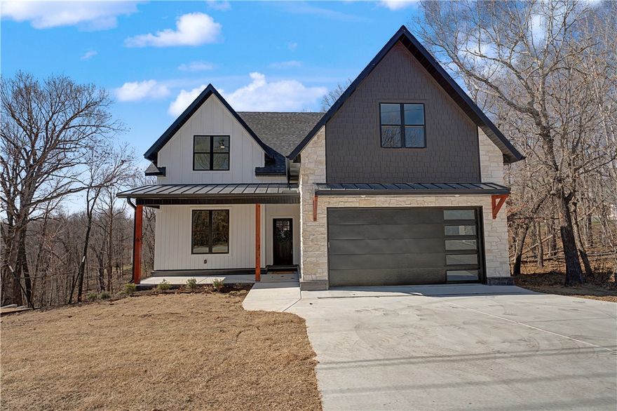 Quality craftsmanship, peaceful wooded views, over an acre, and a HUGE unfinished basement! With a mix of timeless and modern styles, this well-crafted and beautifully finished home has 4 bedrooms, an office or den, a bonus room, & 4 full bathrooms, plus 1587+- square feet of unfinished basement with high ceilings & plumbing! Basement not included in square footage. Enjoy the security of a safe room / tornado shelter, a yard to play in, and a beautiful wooded view. Two nice flat yard areas in the side and back to play! Tons of extra value in the basement: use it as it is, or turn it into an exercise / workout area, workshop, mother-in-law suite, or use the thoughtfully planned multiple entries for extra income! Great opportunity for multi-generational living if that's what you need. 360 degree virtual tour available on separate site - just like you are walking through it! (Ask agents) Homes with over an acre, endless storage, and with this convenient location are very difficult to find - come see it!