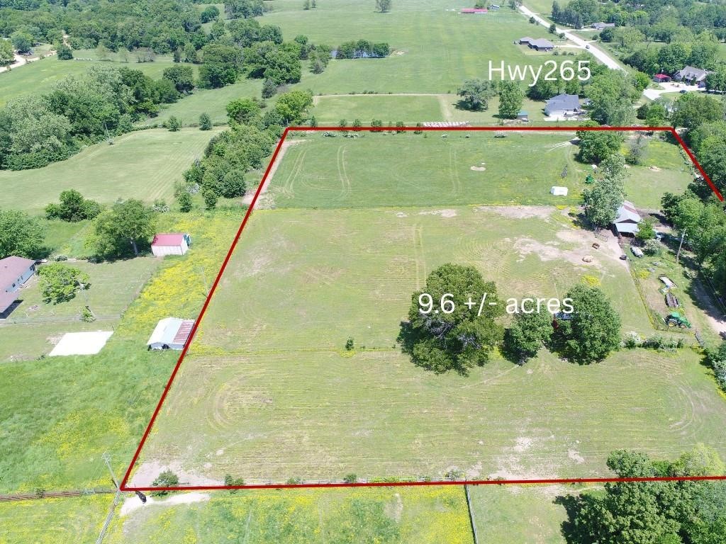 Development opportunity in Pea Ridge, located just one mile North of Pea Ridge Junior High School on Highway 265. Newly annexed and re-zoned R-3 for multifamily residential. This 9.58 +/- acre tract is in a prime location for townhomes or duplex units. A 6" water main runs along Highway 265 to tie into and sewer lines are located just South of Pea Ridge City Park. This property will make a nice subdivision for the right investor or developer.