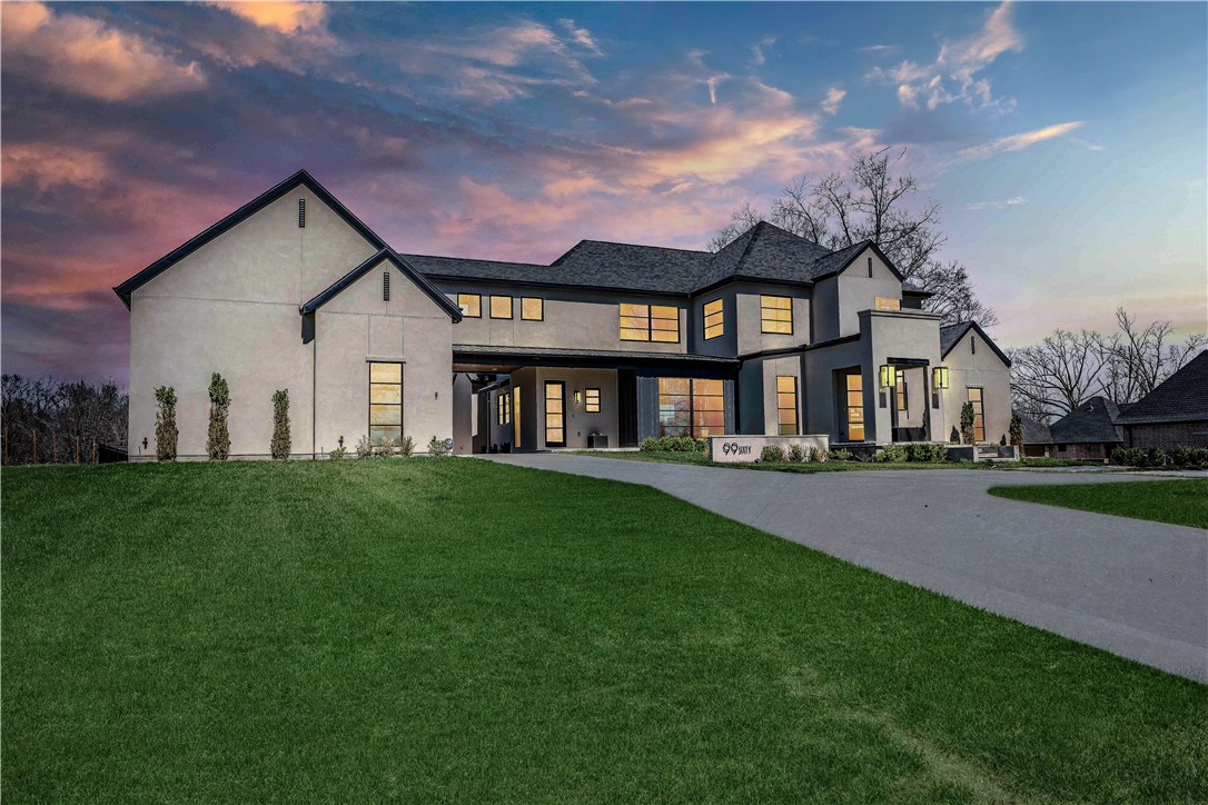 Witness the perfection of this spectacular custom built contemporary home, available for the first time. Designed by a Bentonville Architect and built in 2021 by a Fayetteville luxury builder. Located within 3 miles from the Bentonville Square, Crystal Bridges Museum and Wal-Martās new corporate office, and nestled on 1.41 private acres. Exquisite details abound in the selections of fixtures, finishes, appliances, and smart home technology. The master chefās kitchen with butlerās pantry, Subzero refrigerator, induction cooktop, Wolf double ovens and 2 dishwashers with ample seating and an open concept are unparalleled for entertaining. Marvel at the state-of-the-art home technology such as the automated interior and exterior accent lighting, Racchio irrigation system, My-Q garage, four zone whole home audio and the whole home Generac Generator. The Windsor Pinnacle Select Windows provide full glass views of the private estate and unsurpassed energy ratings. There truly is nothing that compares.