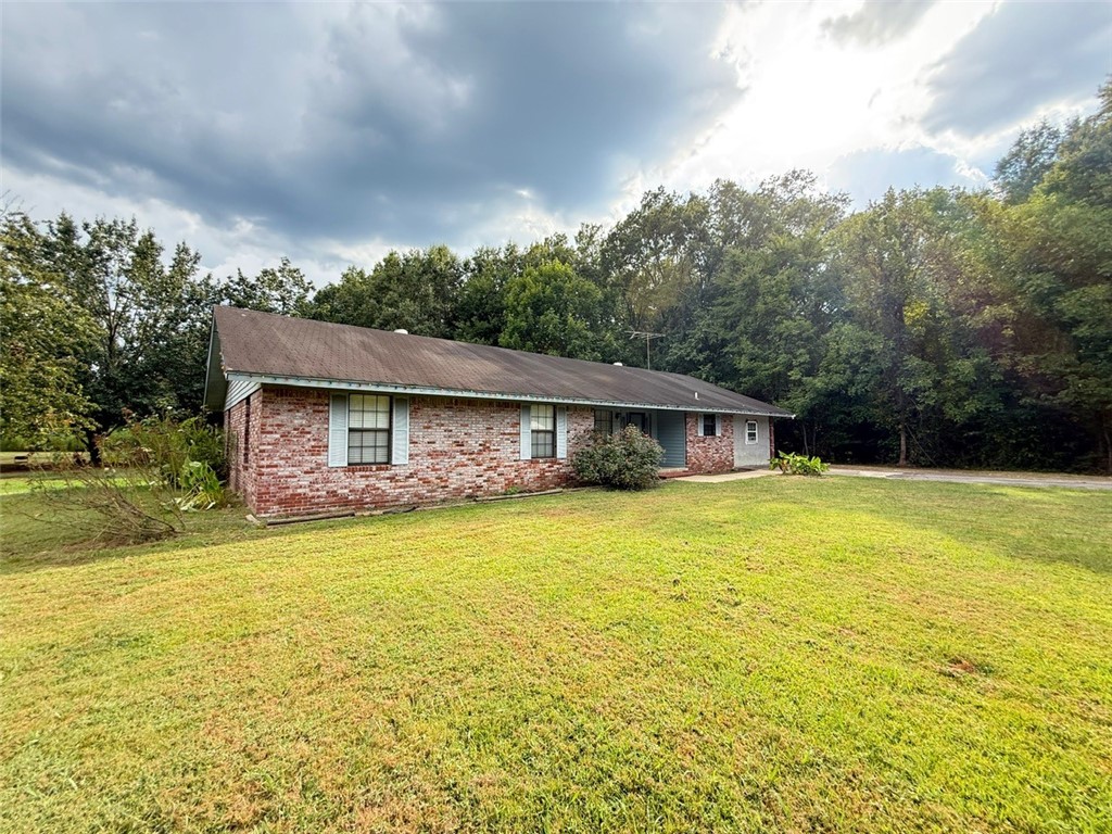 Beautiful home nestled on 3.46 acres, offering the perfect blend of comfort and country charm. This spacious 3-bedroom, 1-bath home features a versatile bonus room ideal for a game room, gym, or home office. Enjoy large open living and dining areas, a generous kitchen with abundant cabinet space, a breakfast bar, and a roomy laundry area. Additional features include ceiling fans, an attic fan, and a recently updated central AC and heat system (only 3 years old) for year-round comfort.
Outside, you'll find a large detached workshop with a concrete floor and half bath ā perfect for family gatherings, hobbies, or extra storage. The property also includes an outdoor wood-burning system that provides heat and hot water for the home. With plenty of space for gardening, animals, or outdoor activities, this is an ideal spot for your mini-farm dreams. Donāt miss the opportunity to make this peaceful retreat your own ā schedule your showing today!