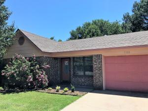 Cute home with updated flooring throughout within minutes from Arkansas Tech, local shopping and restaurants. Fenced in back yard with outbuilding for additional storage!