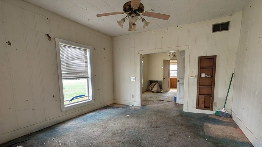 This is your chance to own a prime piece of commercial real estate just off 71B in a growing part of Springdale. Originally a home, this property has been rezoned C-2 (Commercial General) — which means you can turn it into an office, salon, boutique, small retail shop, or more.

The house is from the 1960s and needs a full renovation, or you can start fresh and build something new. Great traffic, great visibility, and surrounded by other businesses.
County records has the property as residential but the city wants property to be used commercially.
To be sold AS IS.
Cash Only.
Sellers belongings have been removed, property is empty.