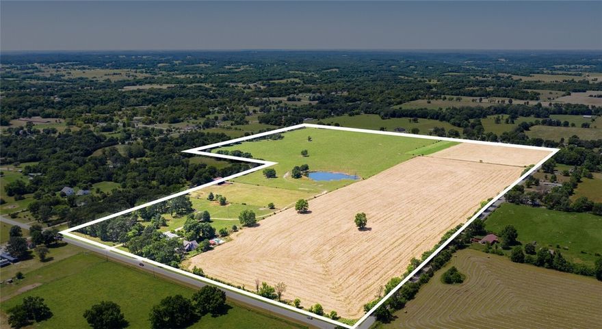 Farm home and 100.28 acres being sold together on the East Side of Pea Ridge.  This property has unlimited development potential.  Approximately 1,318 feet of Highway 72 frontage.  Land is mostly cleared and flat with a small portion facing Highway 72 that is partially wooded.  Seller advised Carroll Electric has recently installed 3 phase power to the South and East side of the property.  City water is available to the property and the seller advises an 8 inch water line is scheduled to be installed on the East side of the property.  City sewer is now available (verify with City of Pea Ridge).  Property can be viewed on three sides via Hwy 72 and County Roads on the East and North.