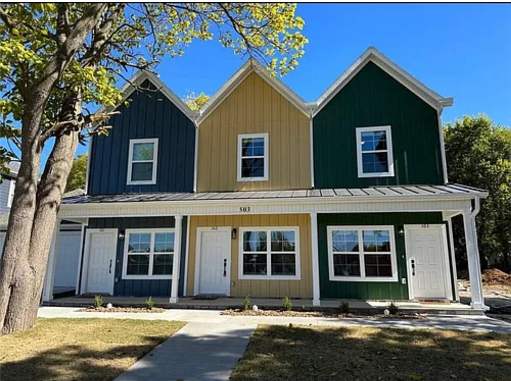 Well-designed 3-bedroom, 2.5-bathroom townhome located near Downtown Rogers. This 1,450 square foot home features an open-concept layout with the primary bedroom suite on the main level. The upper level includes two additional bedrooms and a flex space suitable for a home office or recreation area. The kitchen is equipped with a refrigerator, dishwasher, range, and microwave. Washer and dryer are included. Additional features include a detached garage with an EV charging outlet, attic storage, and a private fenced yard. Property provides convenient access to shopping, dining, and major roadways.