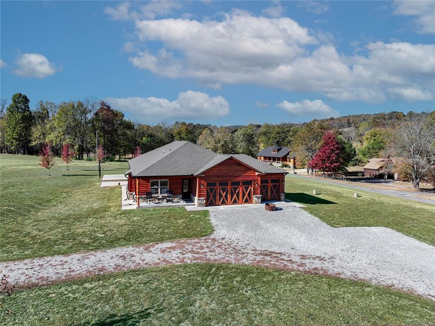 Relax and enjoy the tranquil Kings River just steps from your front door! Enjoy canoeing, fishing or just wading in the crystal clear water. This newer home has a very welcoming open floor with lots of windows to enjoy the beautiful mountain views and whole house generator. Perfect for entertaining and gatherings with a large gourmet kitchen, counter seating as well as a large dining area. Living room has a cozy fireplace for those cool fall days. All homeowners share a common river access, which is just across the street with an easy walk down to the water. Enjoy sitting in the backyard patio or playing a quick game of basketball. This home's oversized 3 car garage will hold all those river toys, plus it's heated and cooled with mini-split. This home is ready for new owners to enjoy!