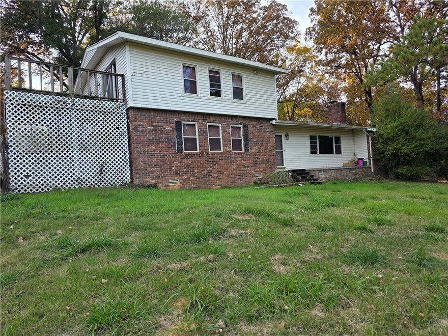 If you love watching HGTV renovation shows and are ready to take on your own project, this one’s for you! This 4-bedroom, 2-bath, two-story home sits on almost 9 acres with beautiful views and plenty of potential. The property includes a 1,280 sq. ft. barn and a 2-car detached garage, offering endless possibilities for storage, hobbies, or livestock.

With a little vision and creativity, this could be your dream home — or a great investment opportunity for someone ready to bring it back to life.