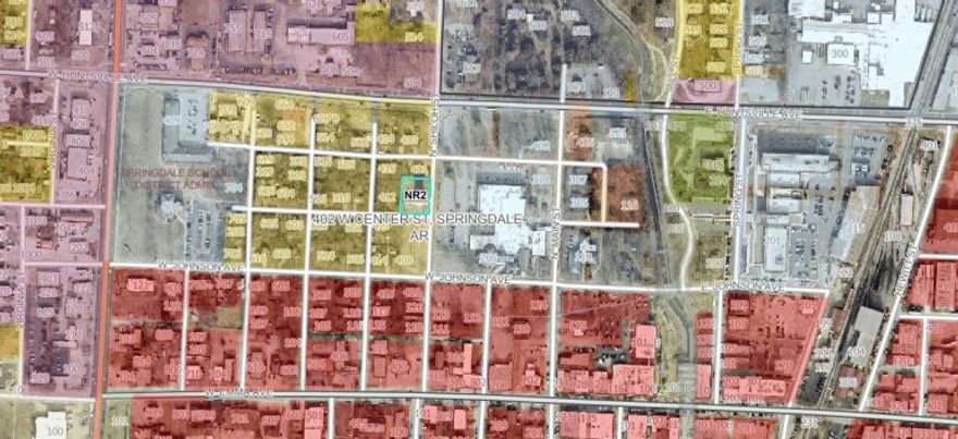 Double size lot on corner, located walking distance to greenway and downtown Springdale. Great location with development potential.  Currently zoned residential.  Is located in the NR2 zone on Springdale City GIS map.