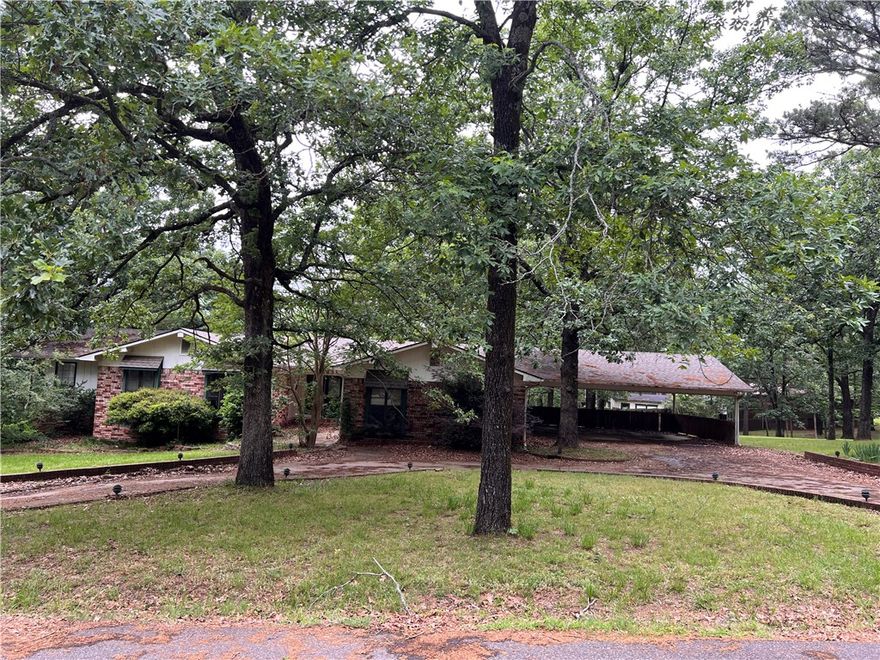 Investor special with strong upside in a desirable area. This 2,600+ sq ft home sits on a spacious 0.75-acre lot with a fully fenced backyard—ideal for value-add improvements and solid resale or rental potential.
The property features a large carport, circular drive for ample parking, and two expansive decks that need TLC, that can be transformed into standout outdoor living or entertainment spaces. Inside, you’ll find two generous living areas, a bright kitchen, a separate dining room plus breakfast area, and a 4-bedroom layout offering flexibility.
The primary suite includes two walk-in closets and private deck access—an appealing feature for future occupants. With a substantial footprint, sizable lot, and opportunity for updates, this property is well-positioned for renovation and equity growth. ** Rear yard is restricted due to safety concerns due to fallen tree and overgrown landscaping.