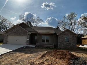 UNDER CONSTRUCTION & NEARLY COMPLETE! Quality craftsmen style is the hallmark of this beautiful new home in Nebo Heights. This 3 BR, 2 BA brick home features the latest in design on the inside too--beautiful hardwood floors throughout the spacious living area and kitchen/dining area. Kitchen features eat-in bar and quartz countertops. Master bath is well-designed with separate walk-in shower and jetted garden tub, double vanities and two walk-in closets.