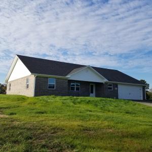 BRAND NEW YEAR, BRAND NEW HOME! If you want a fresh, worry-free and beautiful home, this is exactly what you are looking for! Quality construction, contemporary style and a peaceful location on a big lot in a nice rural neighborhood. A split floorplan is perfect for the family and the master bedroom offers a big master bath, walk-in closet plus a second closet. The granite countertops, custom-made cabinets and center island with oven really make this kitchen stand out above the rest. The large 2 car attached garage has plenty of room, and you have two covered porches for enjoying morning coffee and evening barbeques. Just picture comfortable country living in this perfect home... don't wait, come see it for yourself!