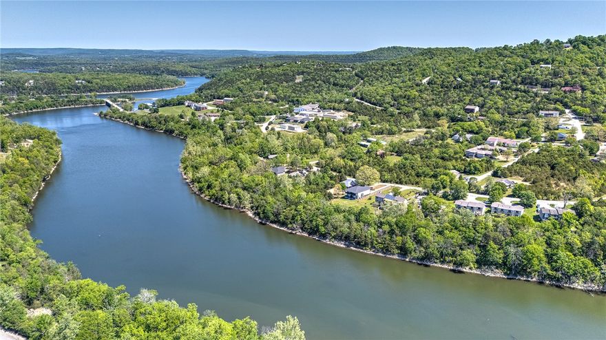 Enjoy lakefront living in this beautifully furnished waterfront condo in Holiday Island near Eureka Springs. Perfectly positioned for serene water views, this move-in-ready property offers comfort, convenience, and natural beauty. The open-concept living and dining area features abundant natural light and tasteful furnishings throughout. The spacious living room flows to a private deck/patio—ideal for morning coffee or relaxing evenings by the water. The kitchen is fully equipped for everyday living or entertaining, while the bedrooms provide comfortable retreats for owners and guests. Sold fully furnished, this turnkey condo is perfect as a full-time residence, vacation getaway, or income-producing rental. Located in the desirable Holiday Island community with access to golf, marina, trails, and just minutes from historic Eureka Springs.
Up to $5000 in Lender credits available