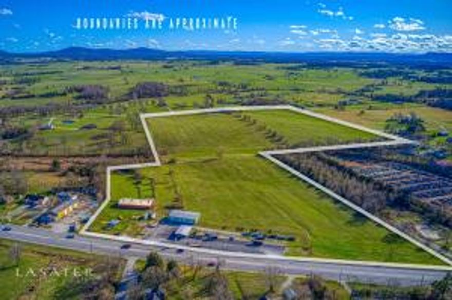 With approximately 834 feet of highly visible highway frontage on Hwy 62/65/412 the sky is the limit with this fantastic commercial property. With an estimated market population of 45,000 you'll draw customers from a six county region that are need of business like a Sam's Club, Target, Costco, and more. A new Bowling Center could work great here. Possibly a shopping center. This location offers tons of possibilities. As Harrison, Bellefonte, Valley Springs and Western Grove continue to grow this stretch of highway is the logical area for commerce expansion. Furthermore, there is paved frontage on Salmon Lane and Campground Road on the West and South sides of the property. The access to this property makes it perfect for a much needed housing development.