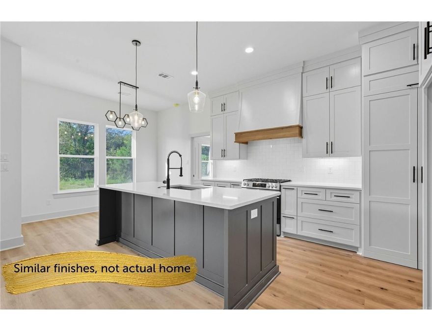 Picture this, a new construction home with a couple of acres, just out of the city life and it is conveniently located about ten minutes to Prairie Grove schools. Finishes include LVP flooring, quartz counters, and more. This exquisite home features quality finishes and attention to detail wrapped up in a well-designed split floor plan and a big covered porch to enjoy the views all while relishing the peace and quiet of your rural setting. The area surrounding the house is cleared and level, providing ample space for outdoor activities, gardening, or simply enjoying the fresh air. Meanwhile, the remaining wooded areas invite exploration and adventure, creating a delightful natural playground right in your backyard. Hurry by now while you can make this house truly your own with choices still available on paint, counters, floor colors and more. Taxes based on the vacant lot and will change. New parcel #tbd.