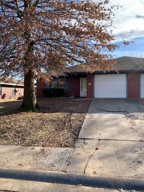 Affordable 2 bedroom 2 bath duplex! This property has several amenities including wood look ceramic tile throughout, two full bathrooms, a privacy fenced back yard, close to Downtown Rogers, Schools, Shopping, and everything Rogers has to offer. Won't last long!