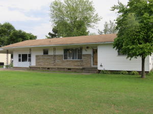 BEAUTIFULLY UPDATED & REMODELED! BRAND NEW ROOF! NEW CHA! Wonderful living spaces, brand new bathrooms, kitchen counter tops,plus gleaming hardwood floors. Living room, family room, and sun room are generously sized. Huge laundry room w/ new HWH. Master suite has new closets and built ins! MOTIVATED SELLER! Approx. 1600 sq ft of living space!