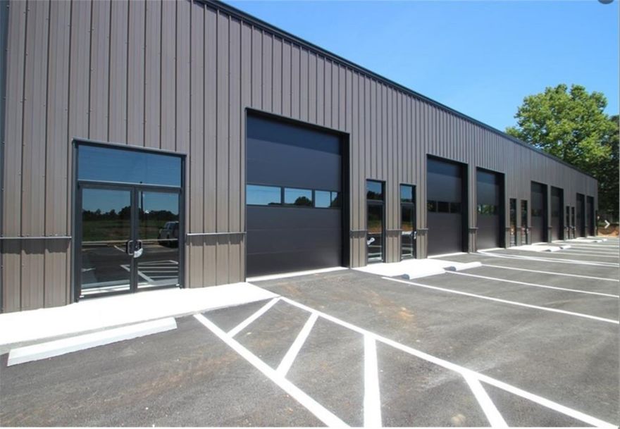 New commercial multi use 5-unit building. Fully leased.