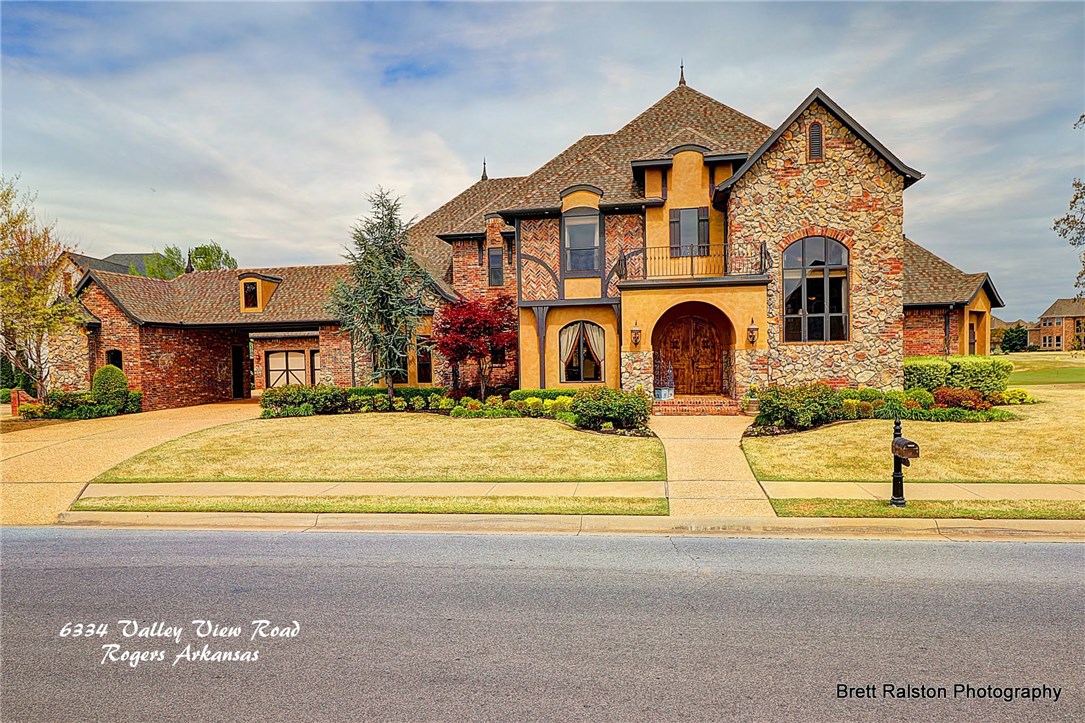 Stunning golf front estate with amazing sweeping view of golf course from outdoor living space & pool designed for relaxation & entertaining. This custom built beauty sprawls graciously on .61 acre lot. Relaxed sophistication awaits in this impressive 2 level home! Featuring 3 living areas, gourmet kitchen, gorgeous master suite & 3 other suites, exercise room & upstairs covered balcony with amazing views.