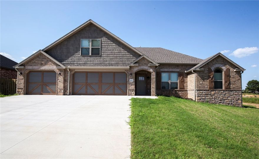 Seller will pay up to $4500 in buyer's closing costs.  New Construction by Cox Development! Beautiful Craftsman Style Home W/4 Bedrooms, 3 Baths, 3 Car Garage, Double Sided Fireplace, Custom Cabinets, Granite Countertops, Split Floor plan, Wood Flooring, Tile, Carpet, Master BR has his/her closets, jacuzzi, & Custom Tiled Shower. Room upstairs can be 4th Bedroom or Bonus Room. Fenced Back Yard, Covered Patio w/built-in Fire Pit to enjoy chilly nights. Call us Today and Take a Look.