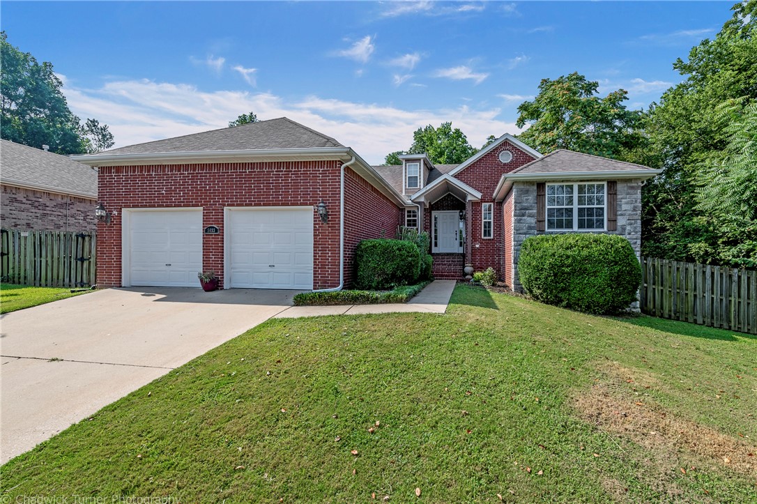 Great home on the west side of Fayetteville. Split floor plan. Living room and bedrooms have wood style flooring. Kitchen, bathrooms and bonus room have tile. Living room includes gas fire place and tray style ceiling. Kitchen features granite counters, black appliances and a pantry. Master suite has 2 separate vanities, step in shower and large closet. Family/bonus room leads to the large deck that is partially covered and large fenced yard.