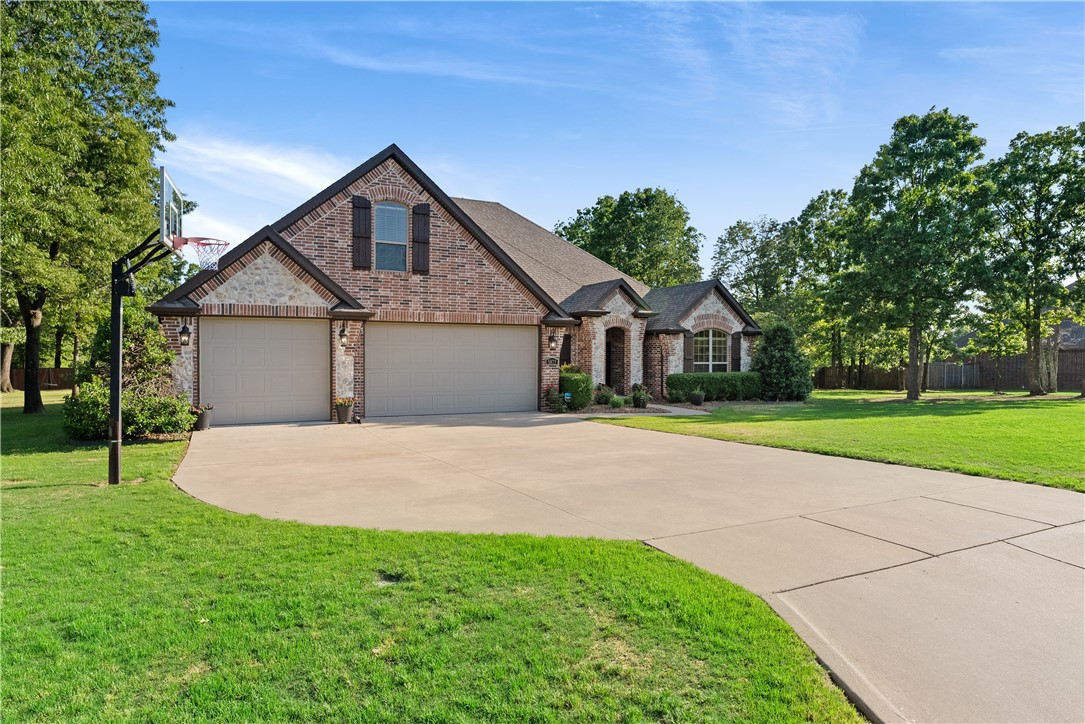 If you are looking for an ALL BUT NEW home in a well established & highly desired neighborhood...Look no further!!!! This home has been meticulously maintained to say the least! All new paint thru-out, beautiful new carpet, new roof and gutters in 2022, Nestled on nearly an acre lot and only 3.3 miles from 1-49. Features include all bedrooms located on the main level, beautiful formal dining, 2 living areas, a gorgeous kitchen with lots of rich cabinetry and in a central location to both living spaces, and Beautiful wood floors thru out the home. Desirable split floor plan with Large Master bedroom & beautiful Master bath with walk-in tiled shower ,jetted tub and his/her vanity sinks. On the same side of home you will find the 2nd bedroom with attached full bath. The 3rd and 4th bedrooms are on opposite side and serviced by a full bath. Large bonus room on the second level for fun and entertaining! Enjoy your morning coffee or evenings outside on your covered patio with beautiful views of the wooded lot. Hurry!