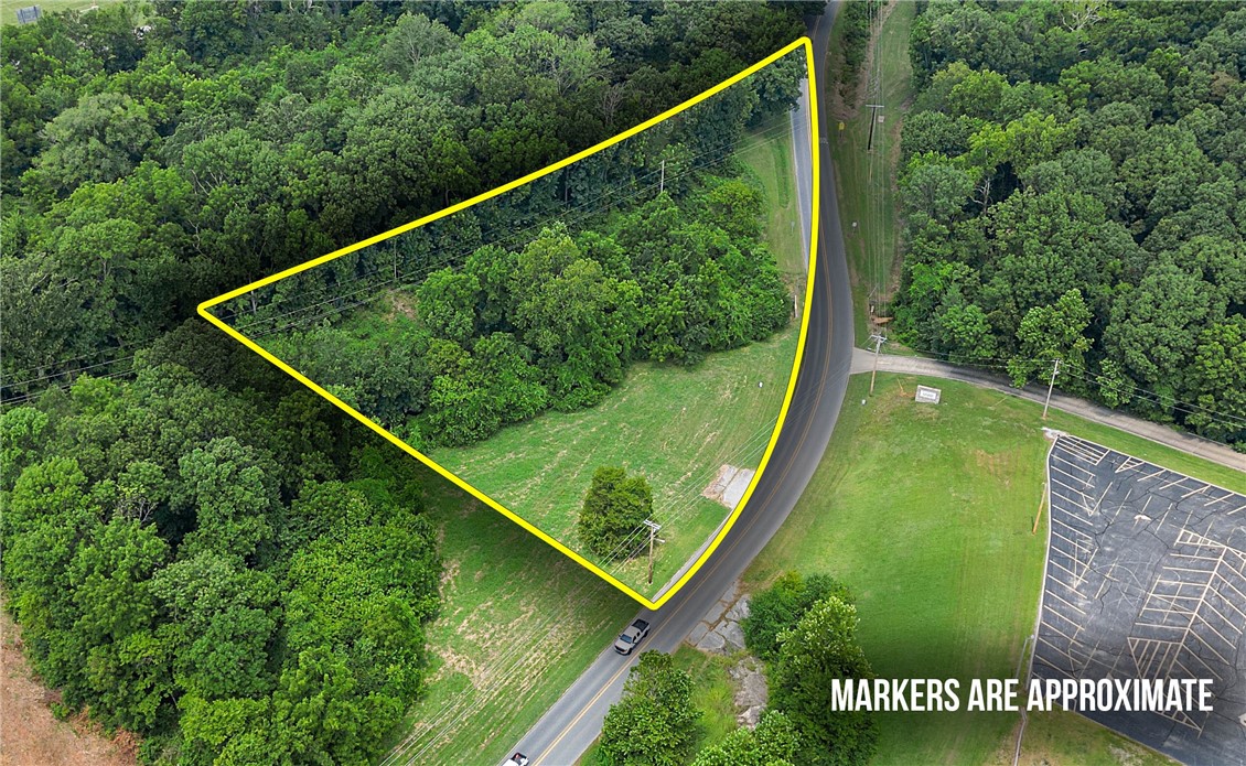 This 1.60 acre parcel of land beams potential. It was on this property that the city of Gravette was birthed. Known in the 1800's as Nebo Valley, a small gathering place at the time, this parcel holds much historical significance to the entire area. Zoned commercial and ready for your build, the property location is stellar. Only seconds from Gravette elementary, intermediate and High School, this property is sure to catch the eye of anyone seeking service. The small brook that flows nearby offers a great setting and the parcel is open and ready for development. The adjacent parcel, also available, has the original spring dating back to the 1800's. There is also the first ever gas station on the parcel. This property is unique to say the least and would be a great place to launch or continue any commercial entity. Additional acreage available. See NABOR MLS#