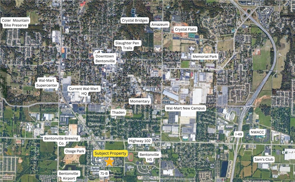 Premier commercial property in the heart of Bentonville, AR, ideally located on a hard, signaled corner w/ significant road frontage on both S Walton Blvd, 339 ft & SE 18th St, 581 ft. This property encompasses 2 buildings: 69,581sqft main building & 15,480sqft secondary structure, all situated on 7.36+/- acre lot w/ a large parking area. The building is fully leased, offering a steady income stream, & boasts a prime location w/ a high daily traffic count of 29,000, maximizing visibility. This property is strategically positioned near the Walmart Home Office, Bentonville Airport, Downtown Bentonville, & the planned 350-acre Walmart Home Office campus. Surrounded by a dynamic mix of dining, entertainment, & professional services, offering tenants & visitors easy access to all Bentonville has to offer. Investors seeking a top-tier property w/ immediate income potential, exceptional visibility, & a prime Bentonville address will find this commercial asset an unmatched opportunity.
