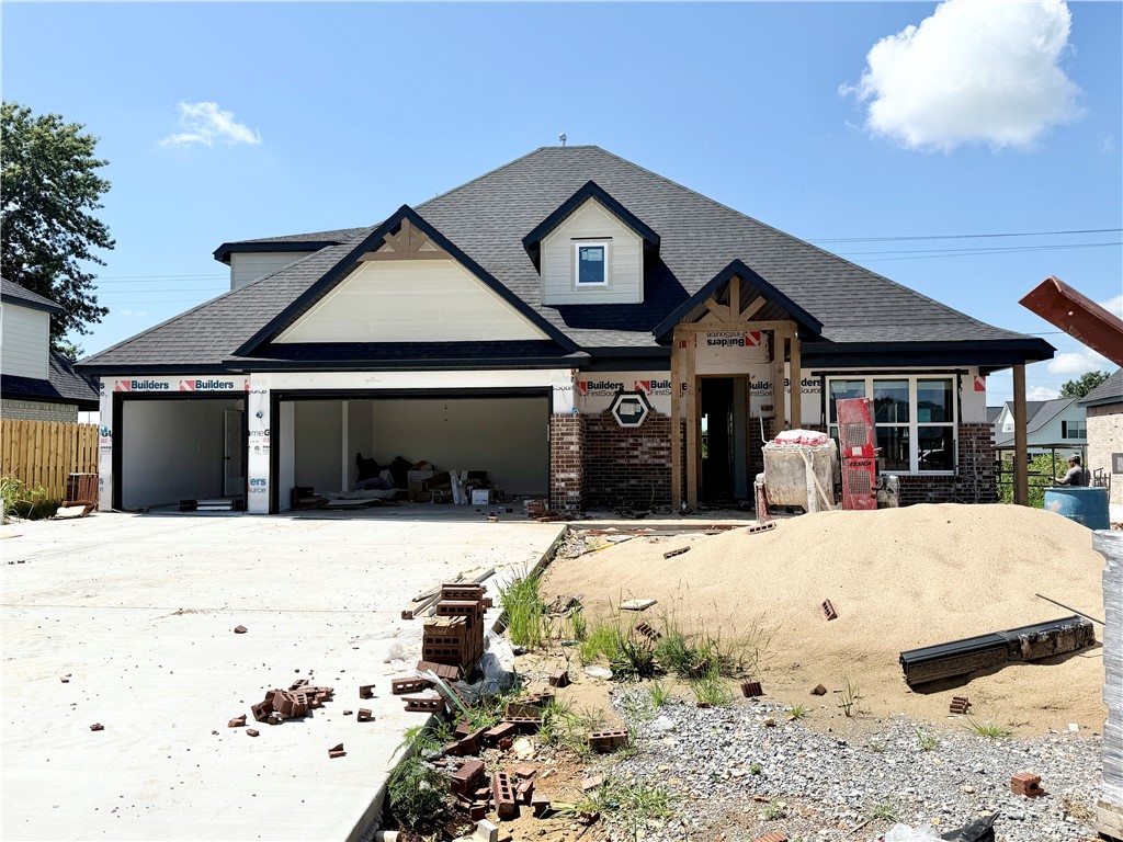Welcome to Tuscany in Centerton! This peaceful neighborhood is just 5 miles from Bentonville and only 11 minutes from the Walmart Home Office. Located less than 2 miles from Bentonville West High School, it's perfect for convenience and top-rated schools. Enjoy community amenities like a pool, clubhouse with gym and kitchen, and a basketball court.Cash Plan with its four bedrooms and two full bathrooms, powder bath boasts so many details that will WOW! The large entry with open stair rail and built in bench welcomes guests and leads them to an open and airy living room. The open kitchen with a large island makes entertaining a breeze. Large pantry hidden behind cabinet doors for a seamless wall of cabinetry, walk-in closets, soft close cabinets, shiplap accents and covered patio are just a few of the many extras!
